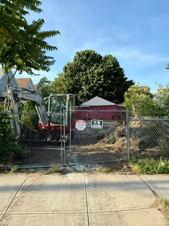 a front view of a house with street