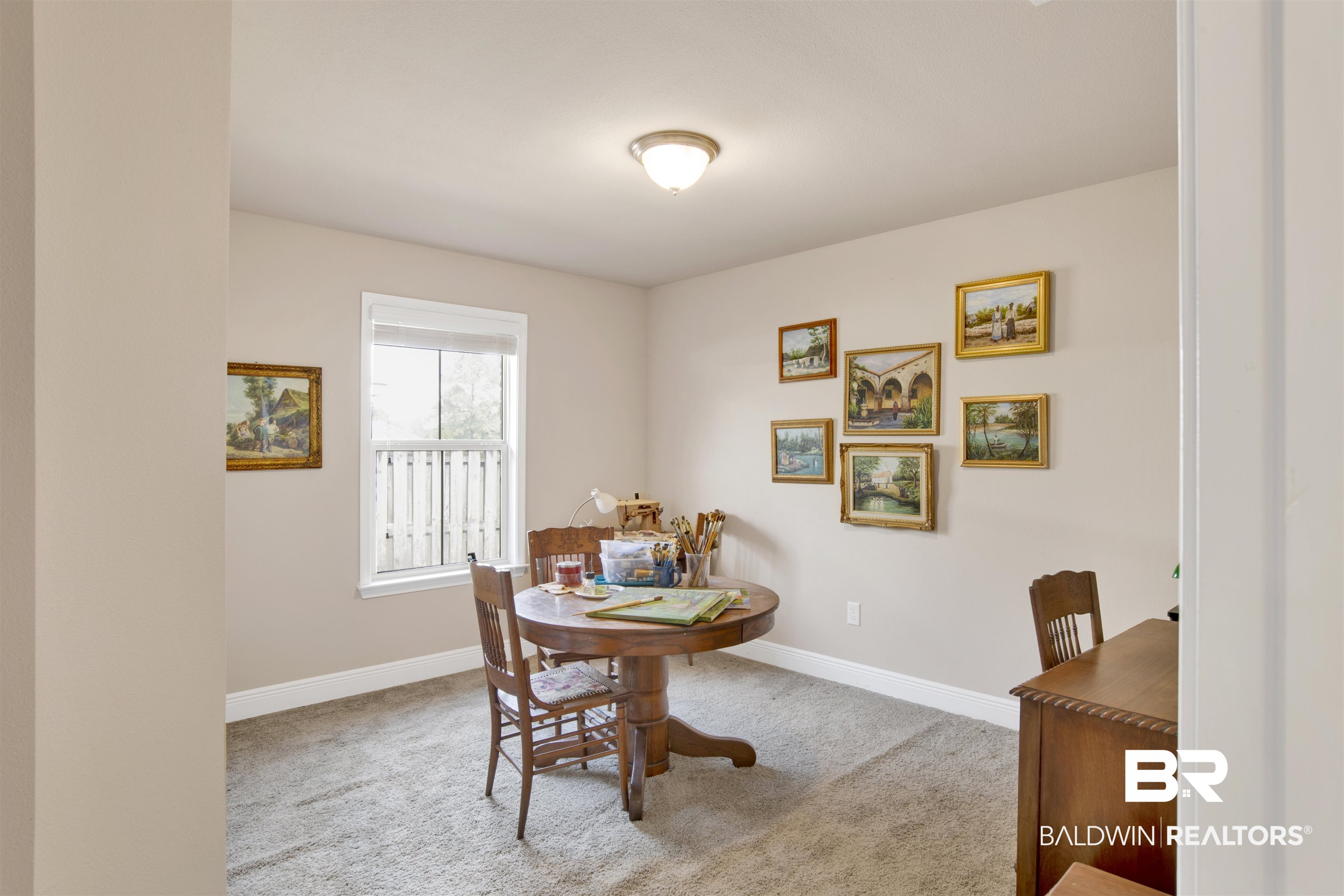 22056 Garland Loop Silverhill, AL 36576 - Photo 19 of 28 Dining space featuring carpet flooring and baseboards
