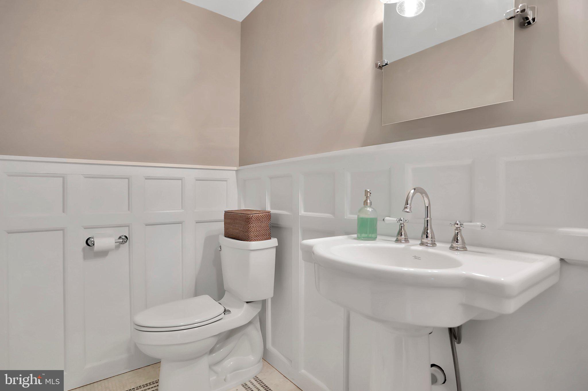 7845 Ridge Road Frederick, MD 21702 - Photo 14 of 67 a bathroom with a sink toilet and mirror