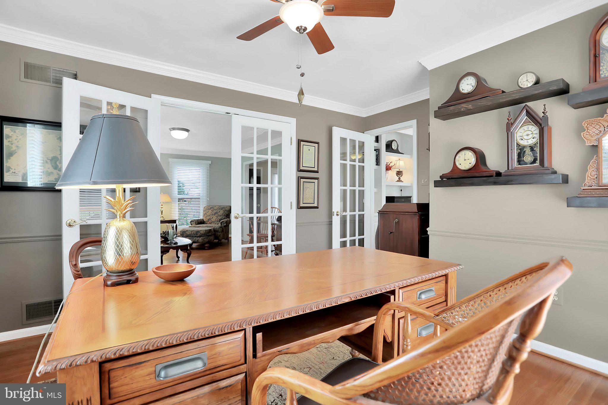 7845 Ridge Road Frederick, MD 21702 - Photo 16 of 67 a view of a dining room with furniture and a chandelier
