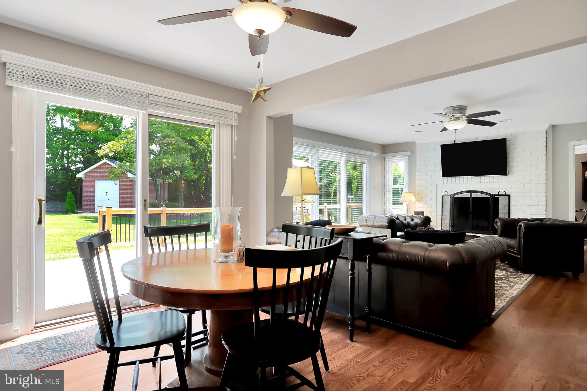 7845 Ridge Road Frederick, MD 21702 - Photo 20 of 67 a view of a dining room with furniture window and wooden floor