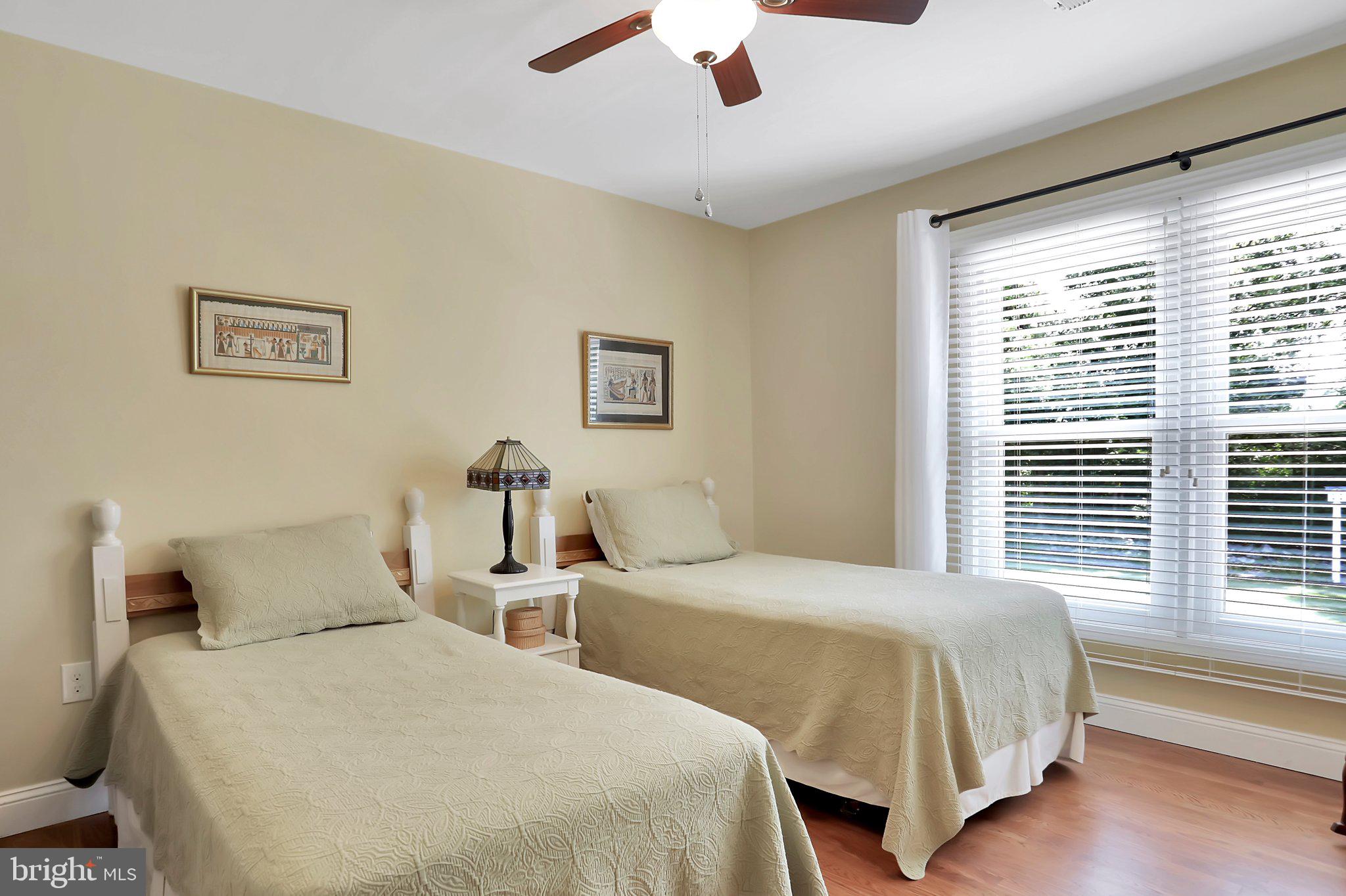 7845 Ridge Road Frederick, MD 21702 - Photo 34 of 67 a bedroom with two beds and a large window