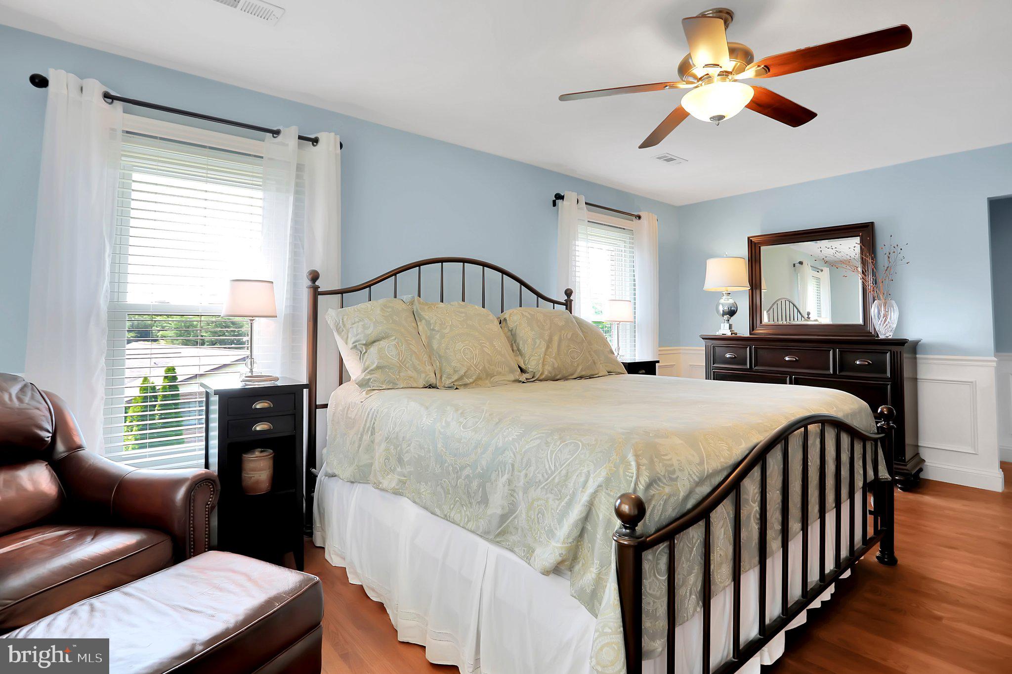 7845 Ridge Road Frederick, MD 21702 - Photo 39 of 67 a bedroom with a bed and a couch
