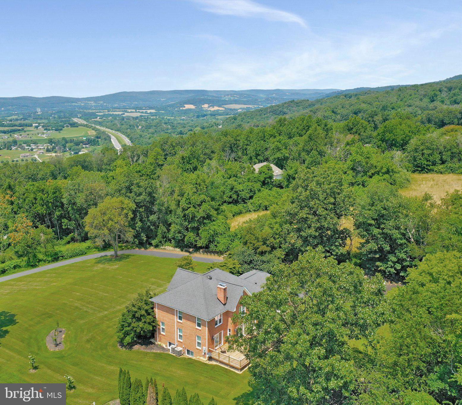 7845 Ridge Road Frederick, MD 21702 - Photo 5 of 67 an aerial view of a house with a yard
