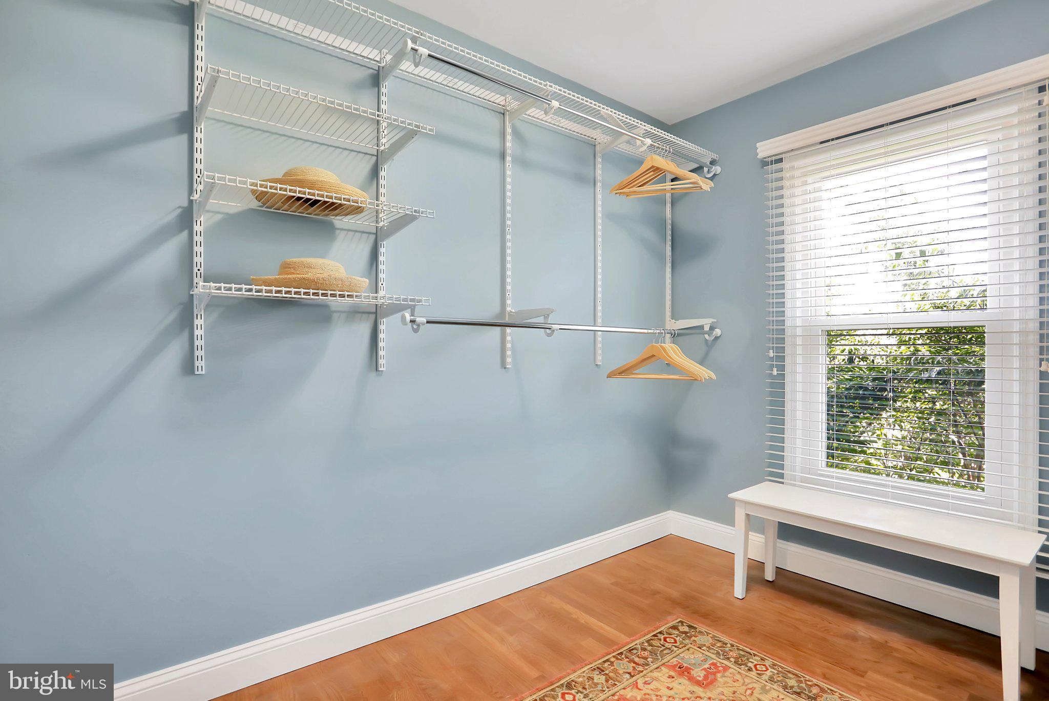 7845 Ridge Road Frederick, MD 21702 - Photo 42 of 67 a view of walk in closet with clothes and shoes