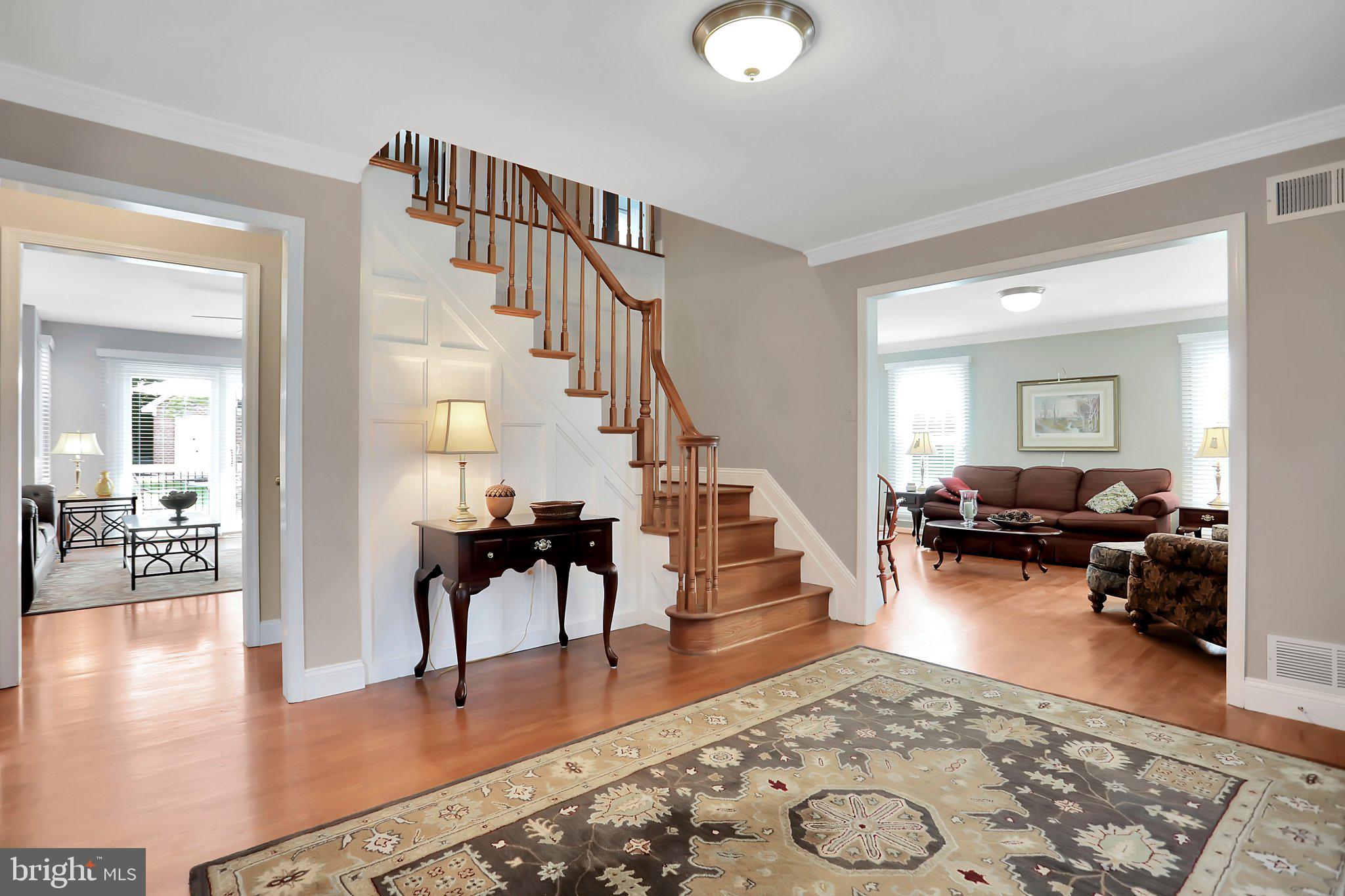 7845 Ridge Road Frederick, MD 21702 - Photo 7 of 67 a living room with furniture and wooden floor