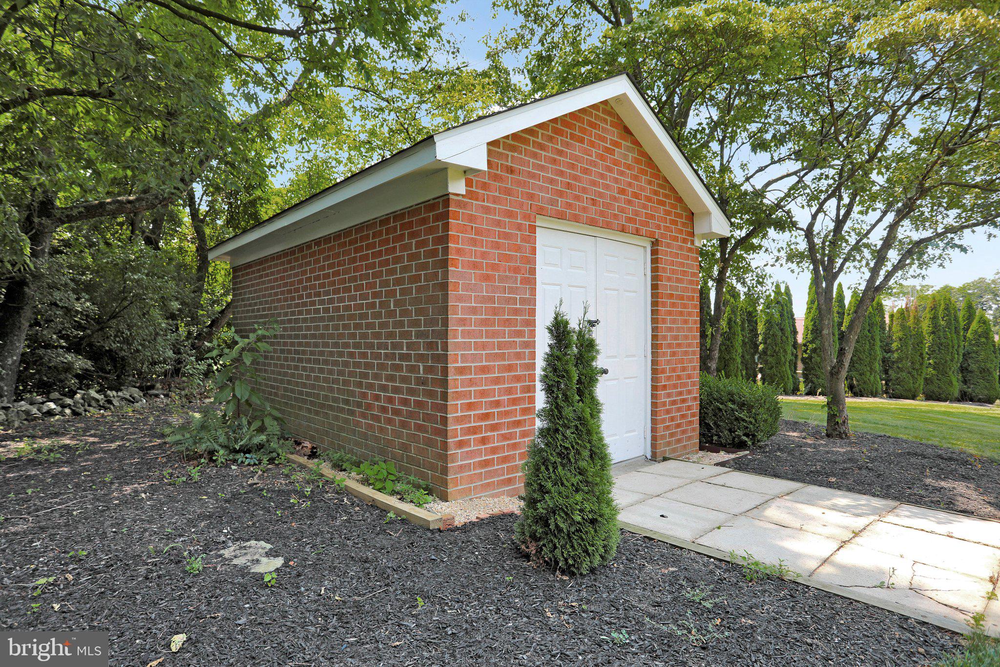 7845 Ridge Road Frederick, MD 21702 - Photo 67 of 67 a front view of a house with garden
