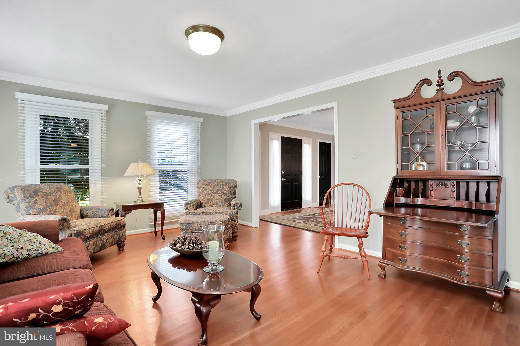 7845 Ridge Road Frederick, MD 21702 - Photo 10 of 67 a living room with furniture and wooden floor
