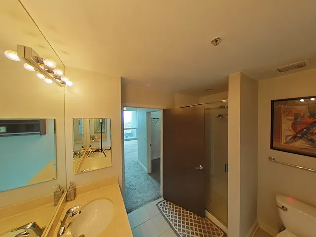 a bathroom with a sink and mirror