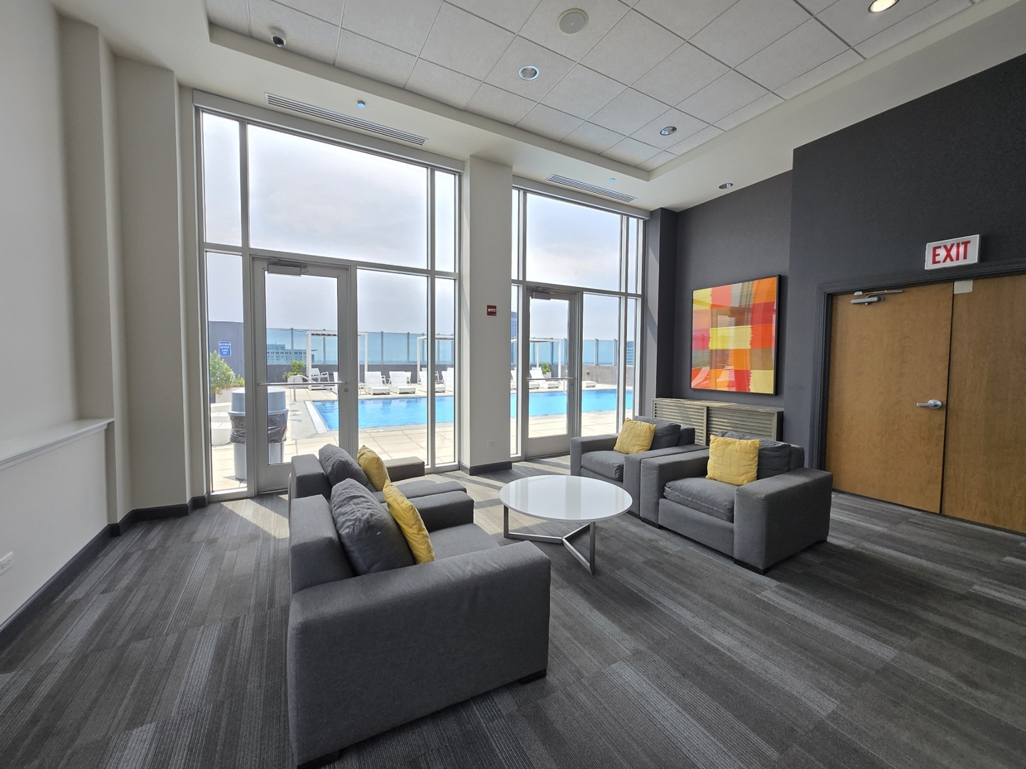 1901 South Calumet Avenue, Unit 1405 Chicago, IL 60616 - Photo 18 of 20 a living room with furniture and a large window
