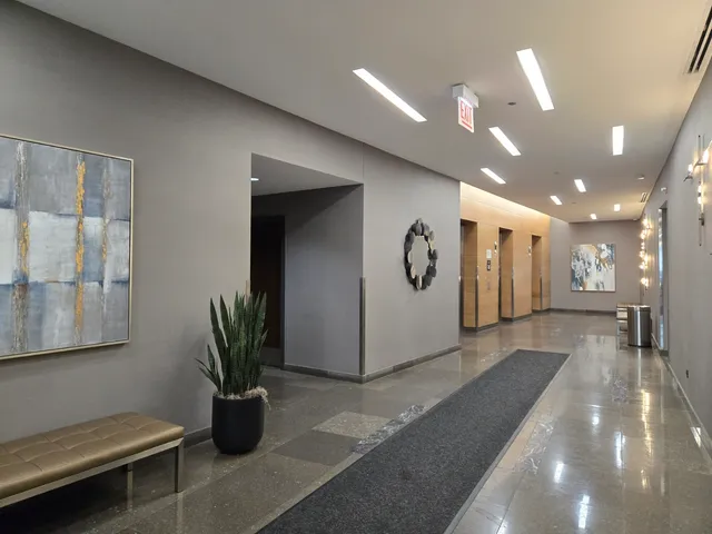 a view of a hallway with workspace