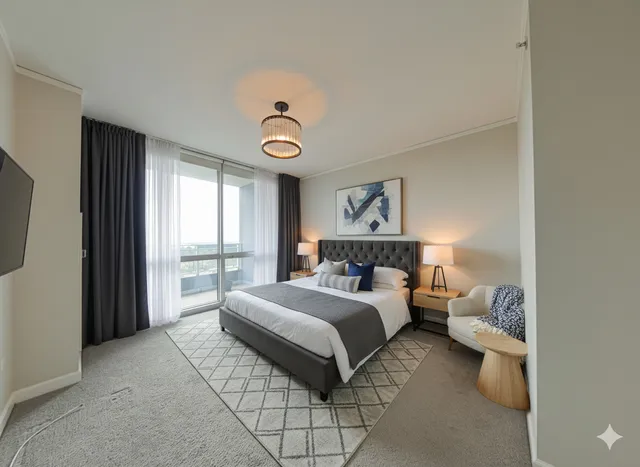 a bedroom with a bed and a window