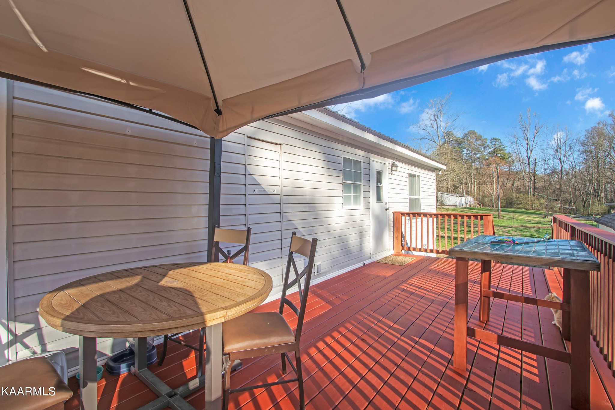 4981 Malone Road Loudon, TN 37774 - Photo 11 of 35 a view of a patio with a table and chairs