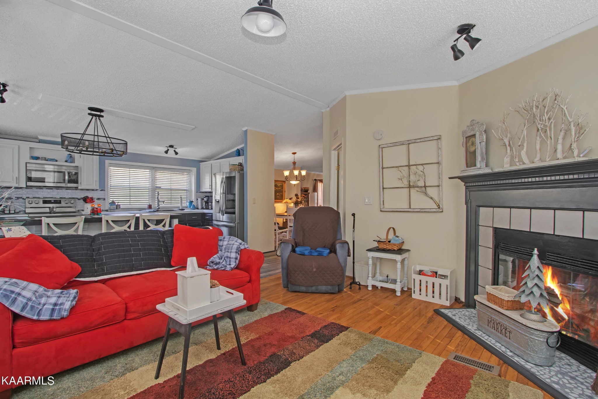 4981 Malone Road Loudon, TN 37774 - Photo 21 of 35 a living room with furniture and a fireplace
