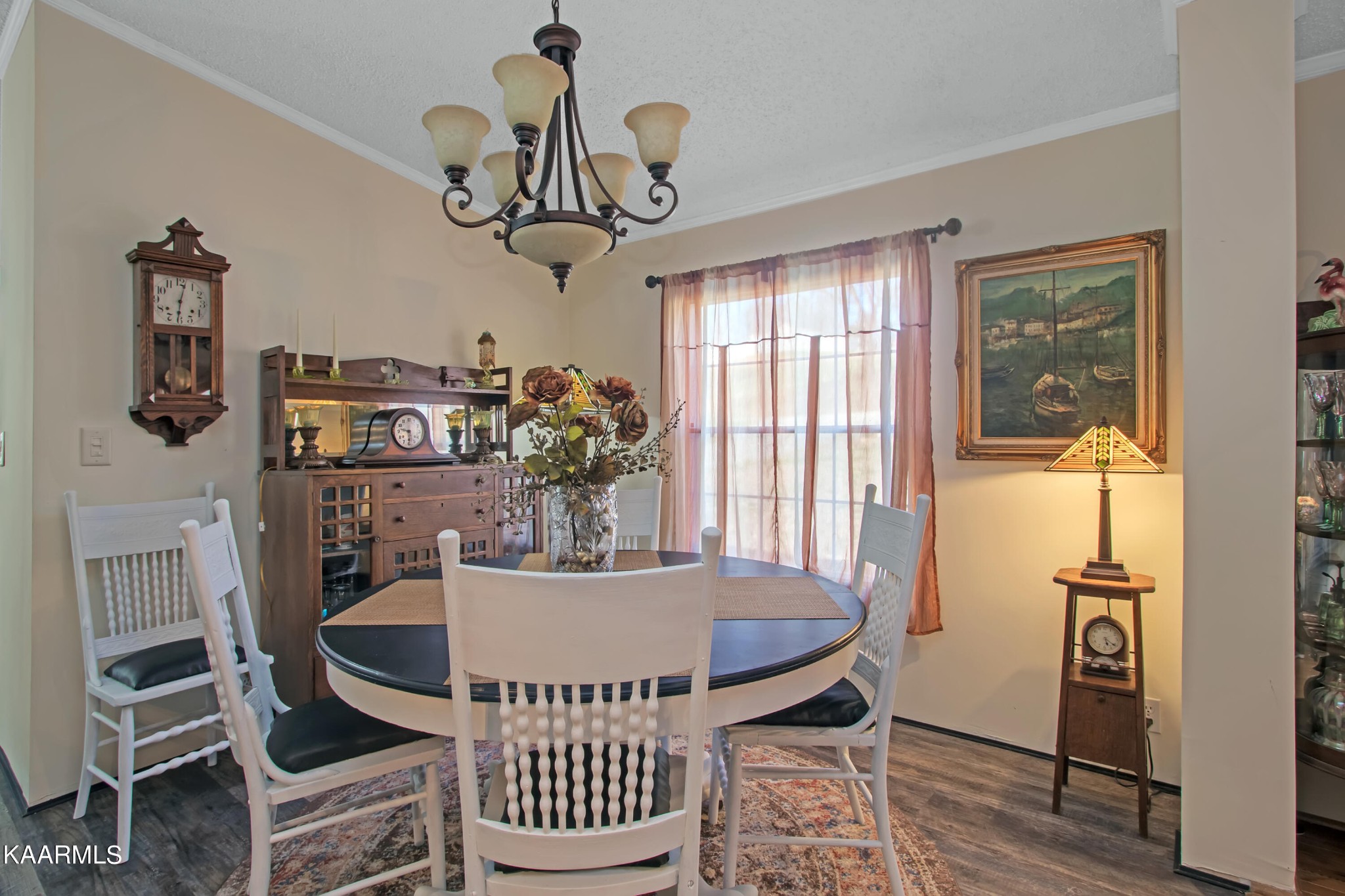 4981 Malone Road Loudon, TN 37774 - Photo 26 of 35 a view of a dining room with furniture window and wooden floor