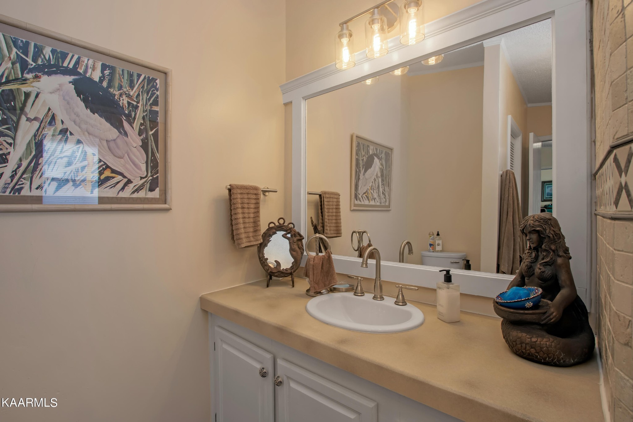 4981 Malone Road Loudon, TN 37774 - Photo 31 of 35 a bathroom with a sink and a mirror