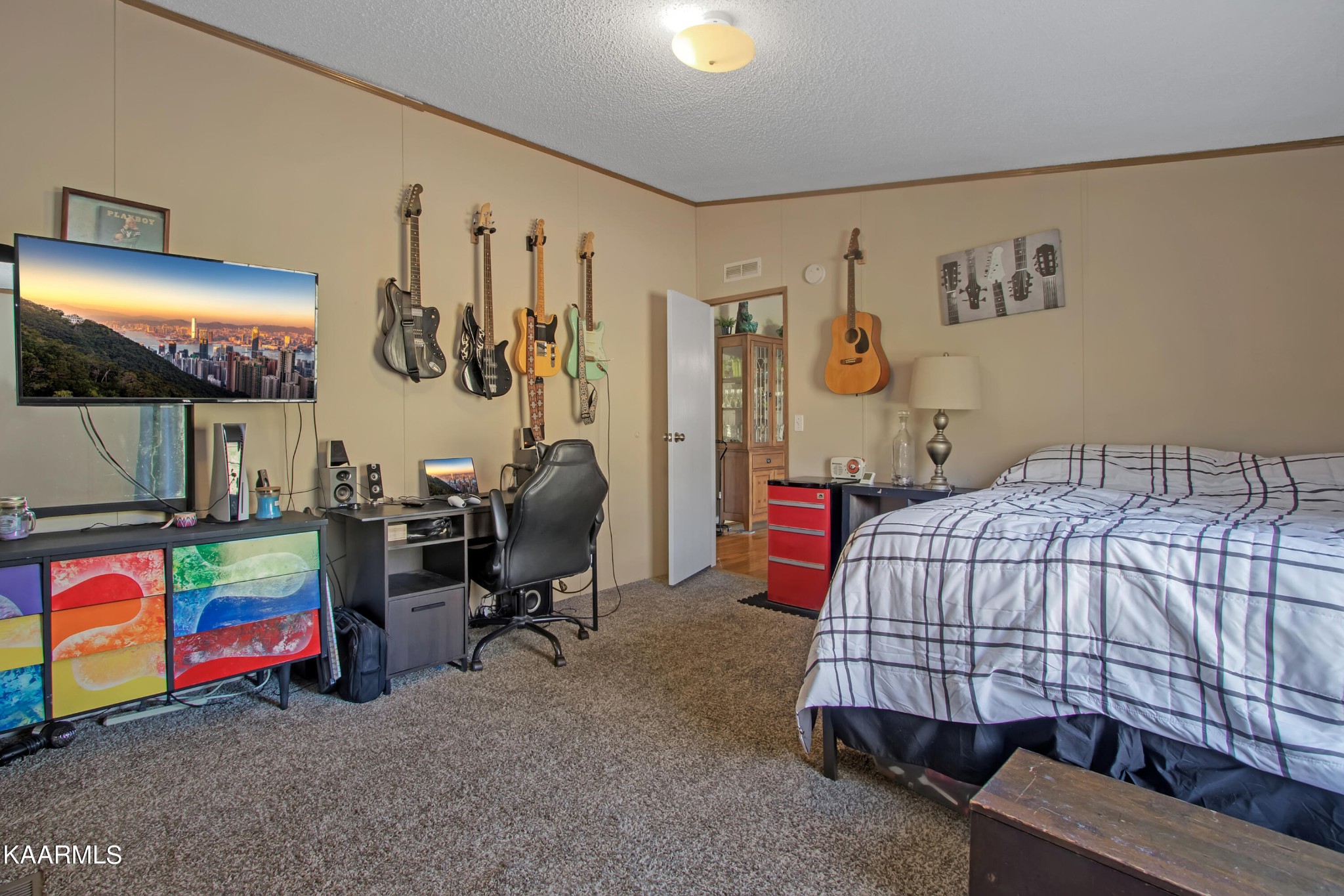 4981 Malone Road Loudon, TN 37774 - Photo 33 of 35 a bedroom with a bed and desk
