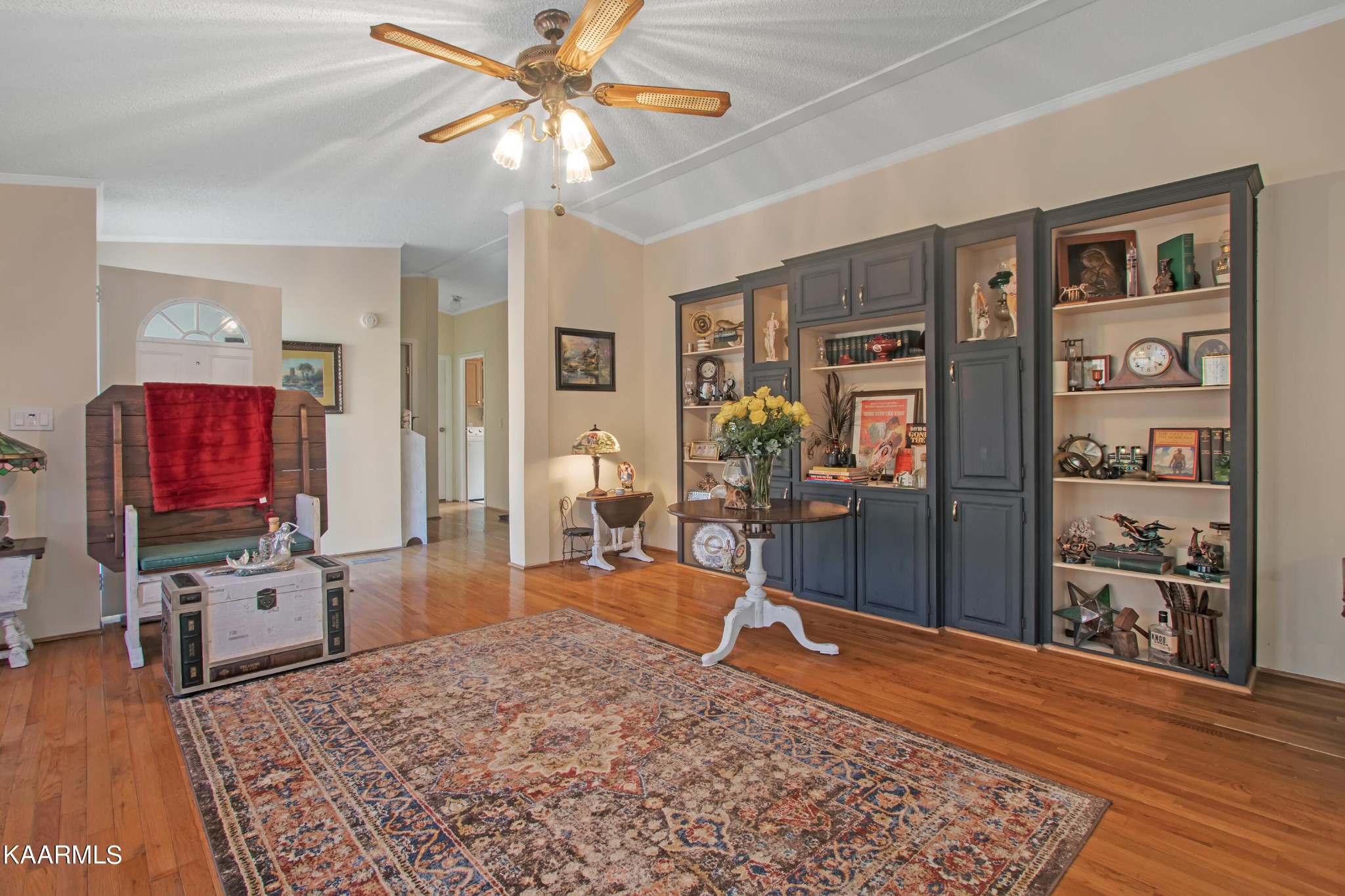 4981 Malone Road Loudon, TN 37774 - Photo 9 of 35 a living room with furniture a flat screen tv and a dining table