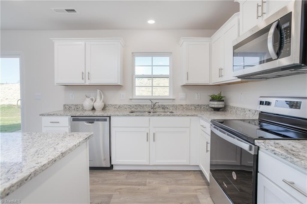 129 Forrest Oaks Drive King, NC 27021 - Photo 13 of 50 Photos are representations and not the actual home. These photos are for informational purposes only.