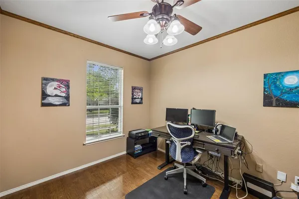 a workspace with furniture and a window