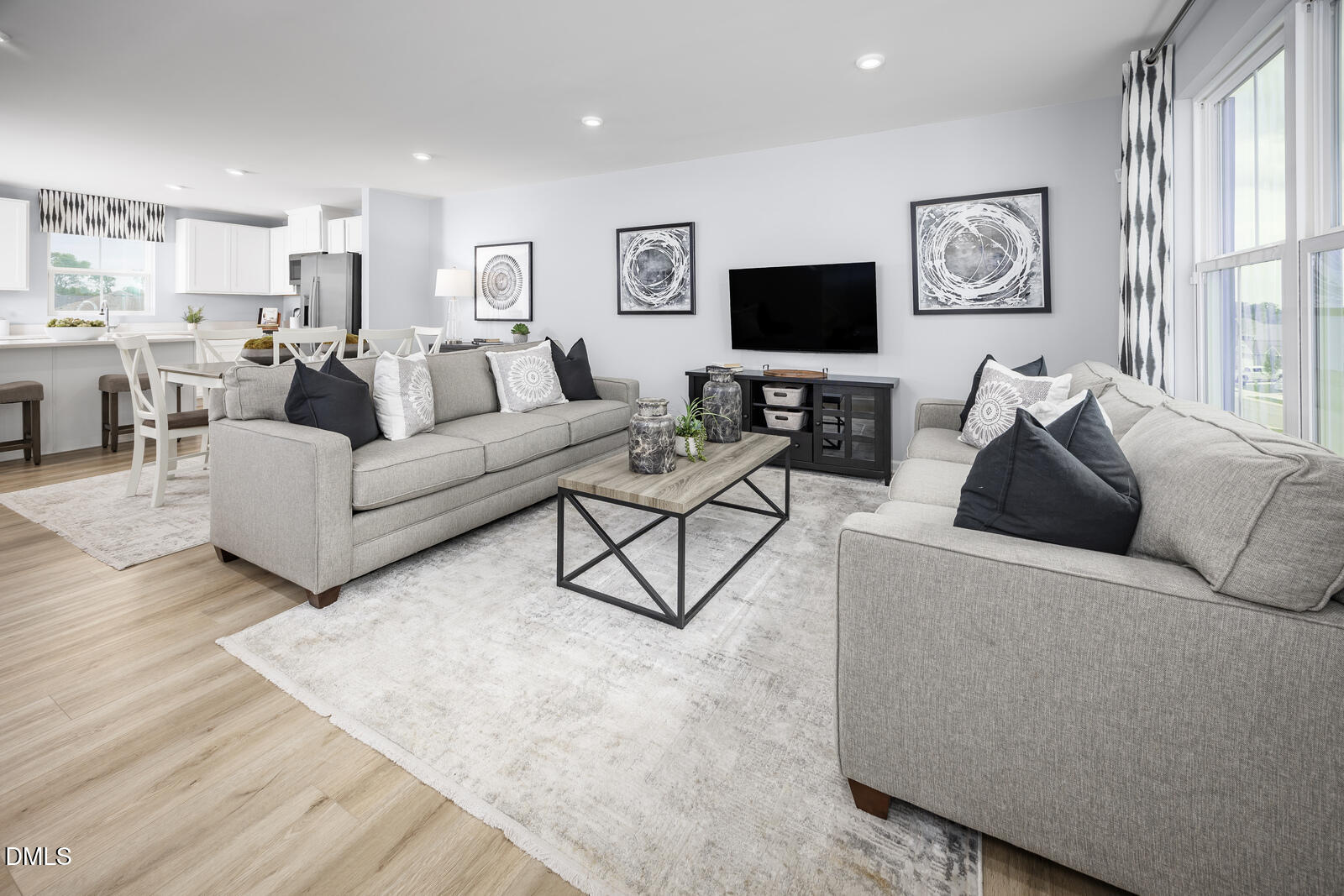 199 Brook Bawn Road Wendell, NC 27591 - Photo 5 of 25 a living room with furniture and a flat screen tv