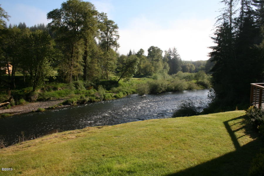 242 Hamer Road Siletz, OR 97380 - Photo 5 of 12 Siletz River in front of home
