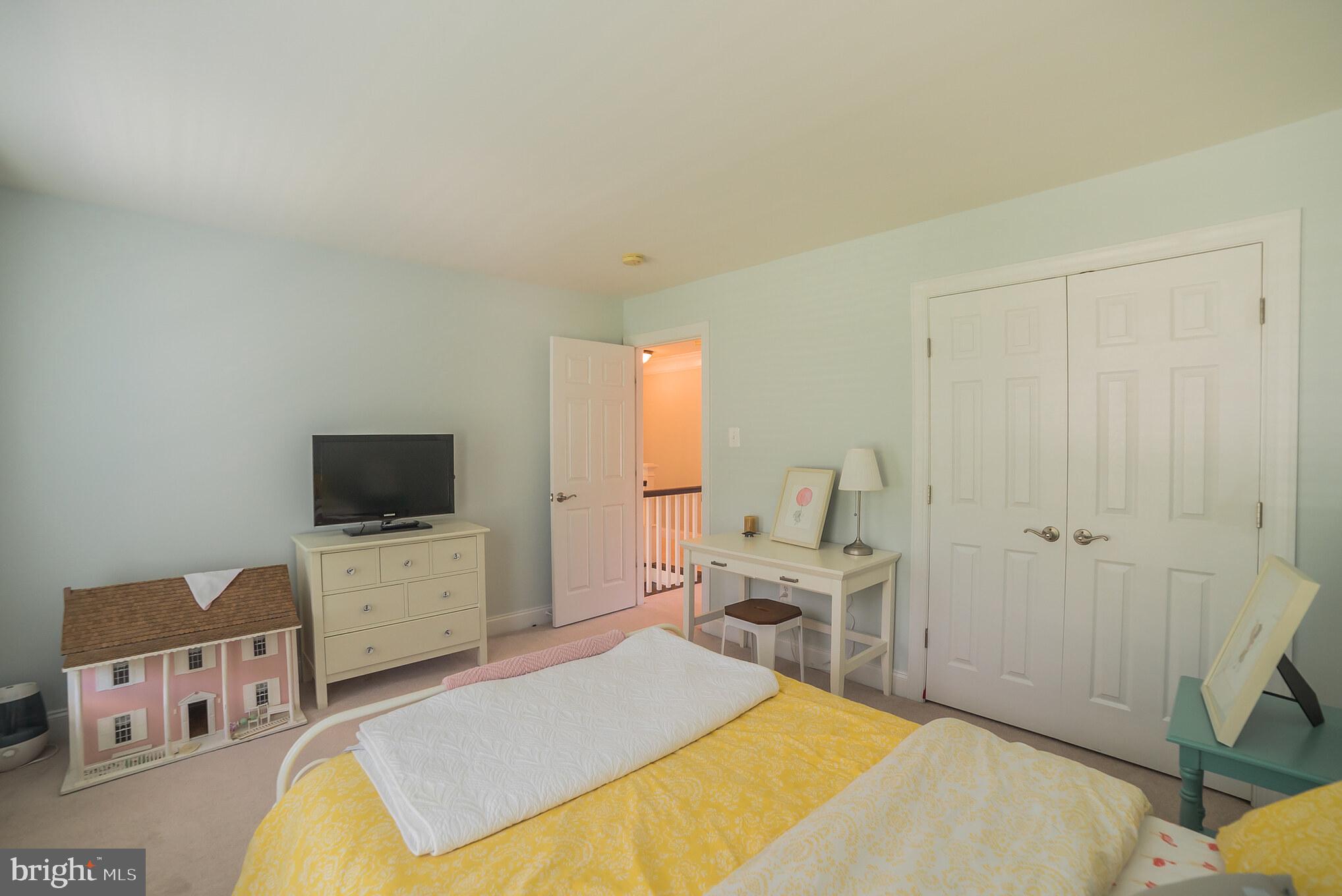 3746 Spring Meadow Drive Ellicott City, MD 21042 - Photo 30 of 40 a bedroom with a bed and flat screen tv