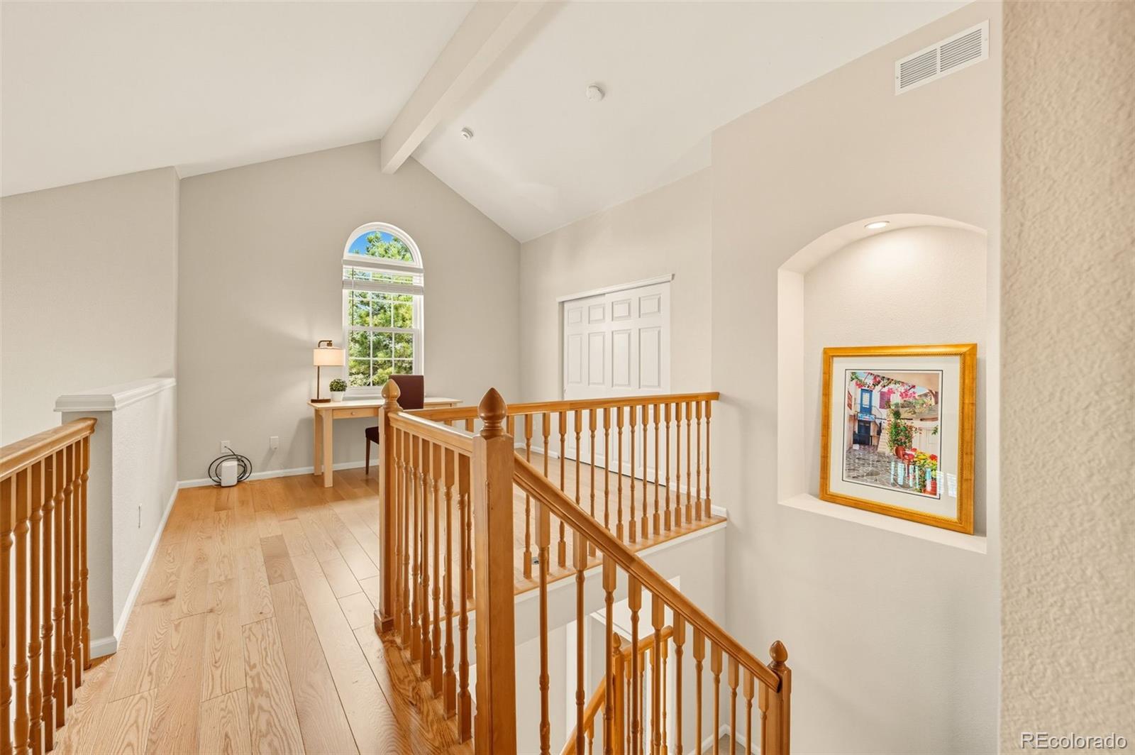 10058 Grove Court, Unit E Westminster, CO 80031 - Photo 27 of 48 a view of a hallway with a window
