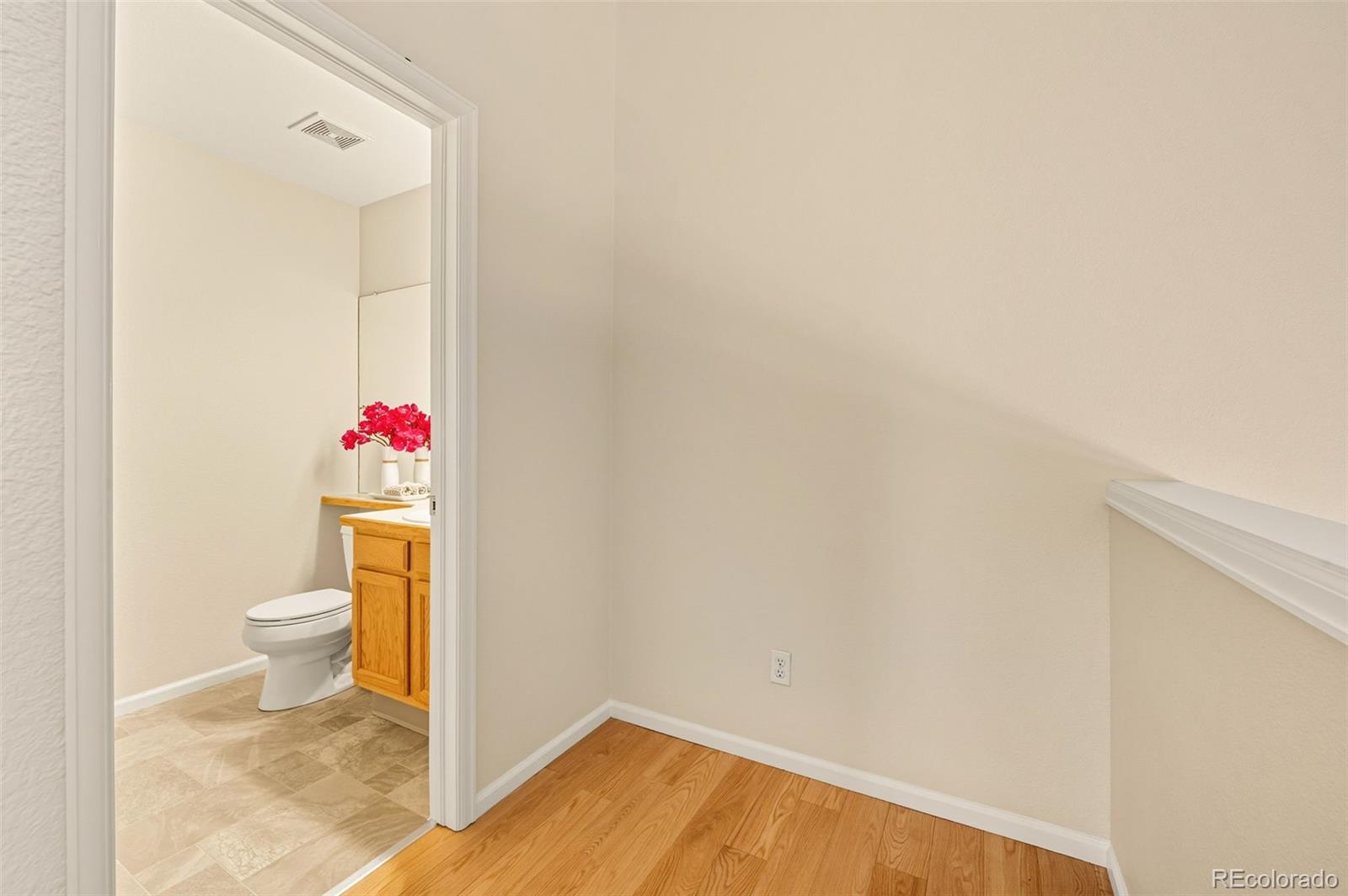 10058 Grove Court, Unit E Westminster, CO 80031 - Photo 29 of 48 a bathroom with a sink and a toilet