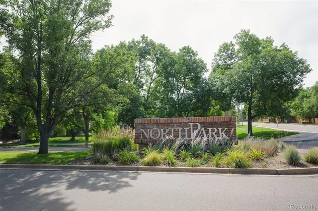 a view of a golf course with a lake