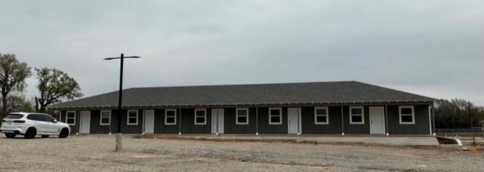 229 Pvt Road, Unit 200 Alvord, TX 76225 - Photo 21 of 25 a front view of a house with a outdoor space