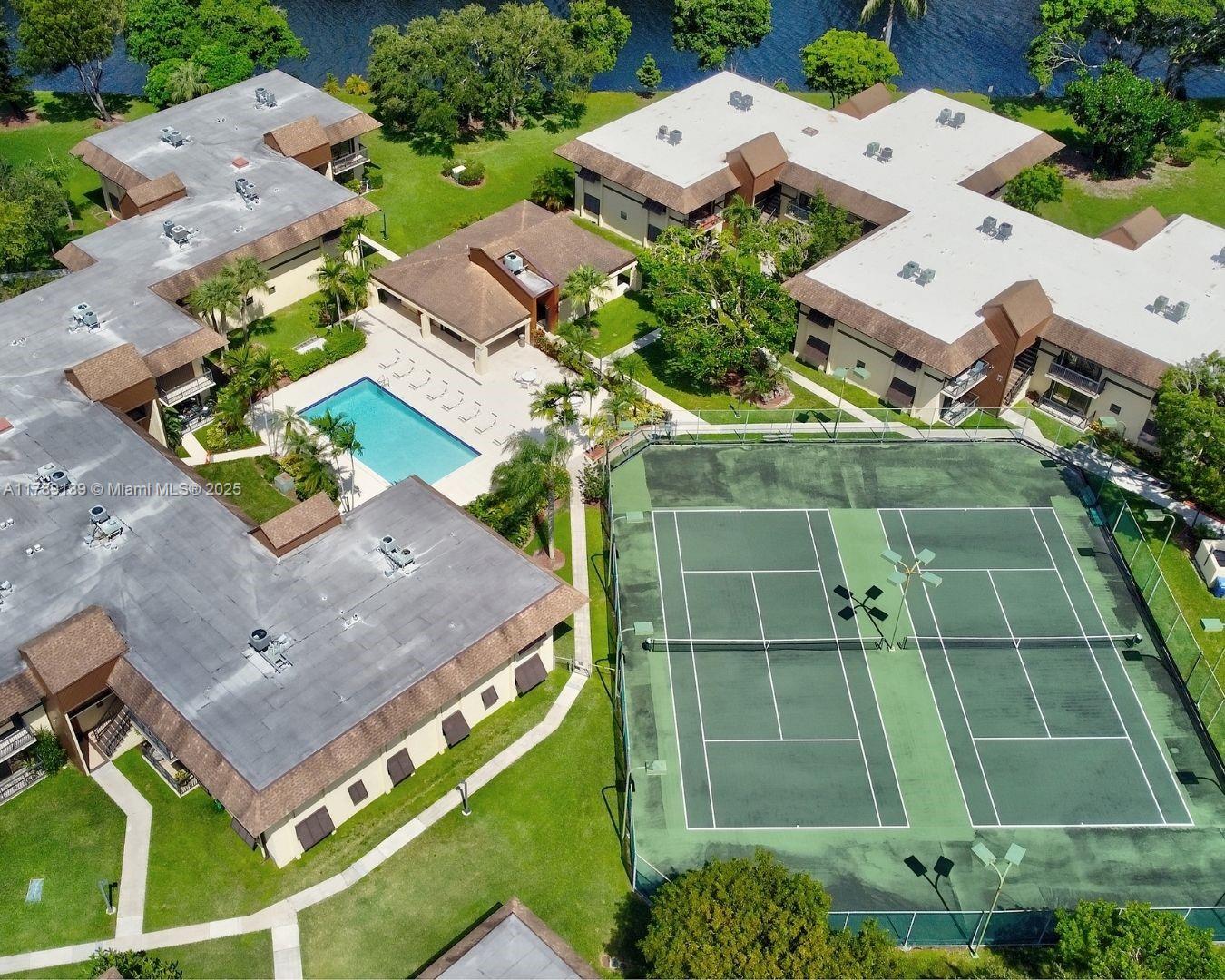 7905 Southwest 86th Street, Unit 626 Miami, FL 33143 - Photo 8 of 8 an aerial view of a house with a yard