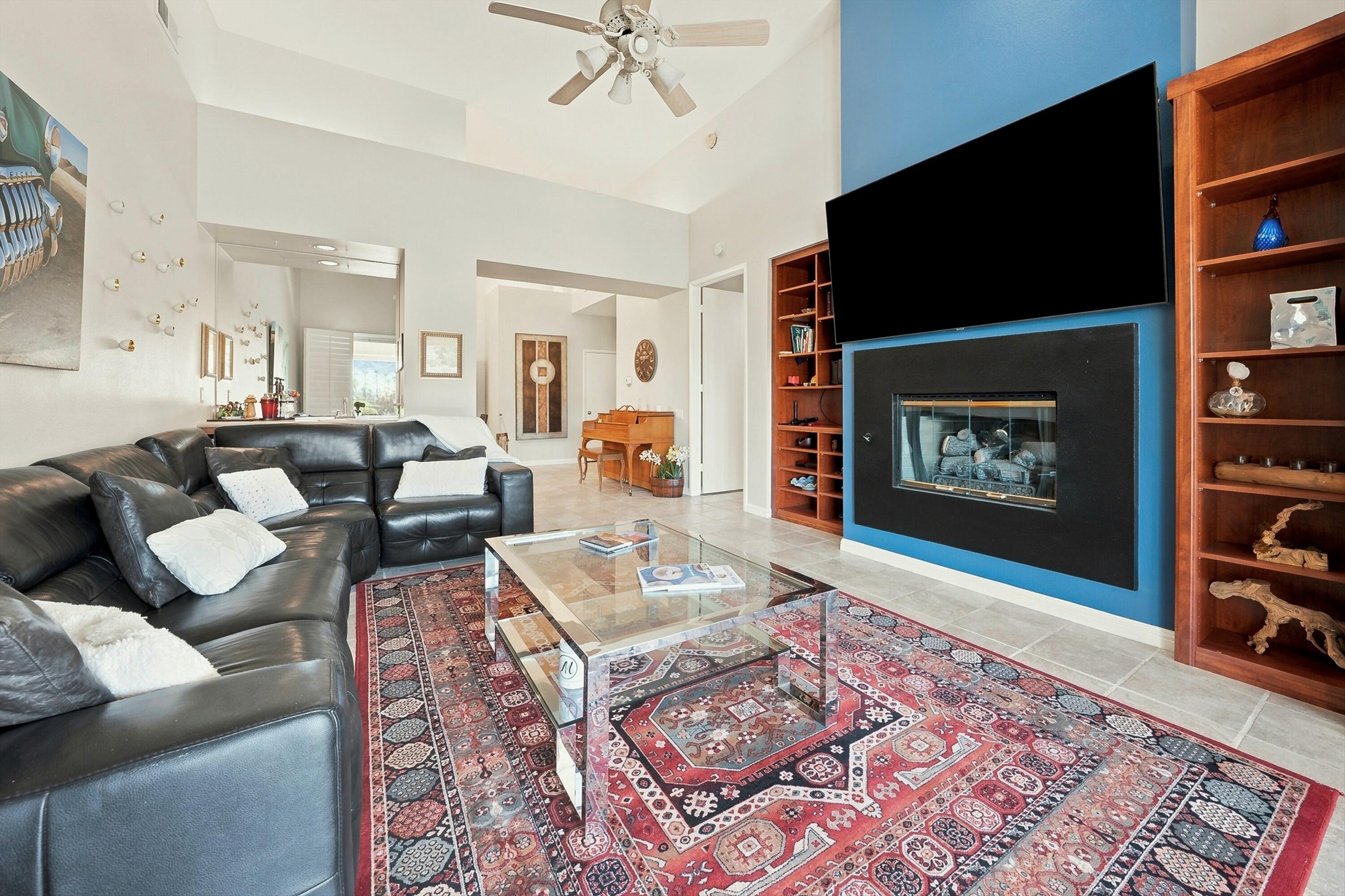 138 Lakeshore Drive Rancho Mirage, CA 92270 - Photo 14 of 30 a living room with furniture and a flat screen tv