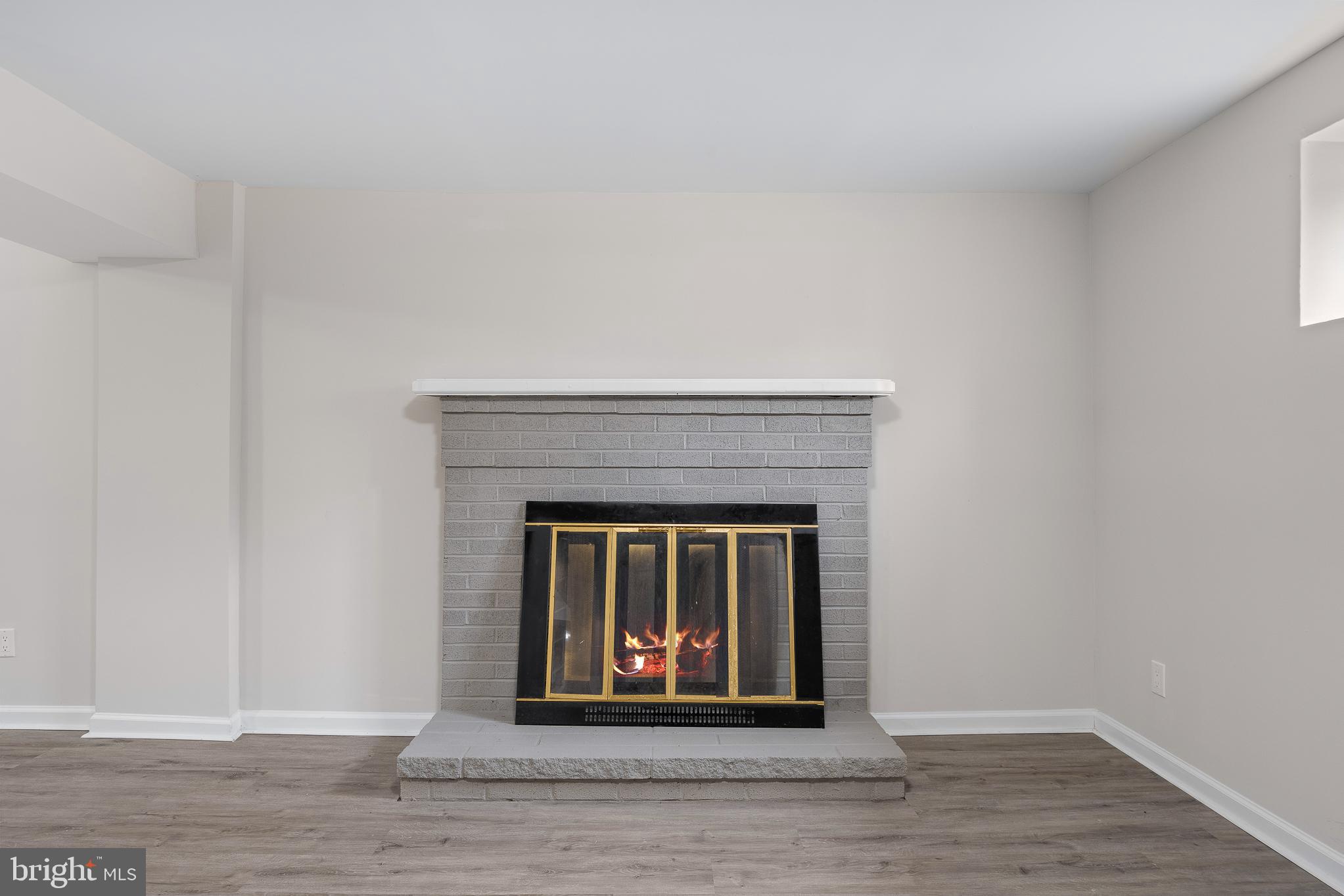 7804 D'Arcy Road District Heights, MD 20747 - Photo 17 of 61 a view of an empty room and wooden floor