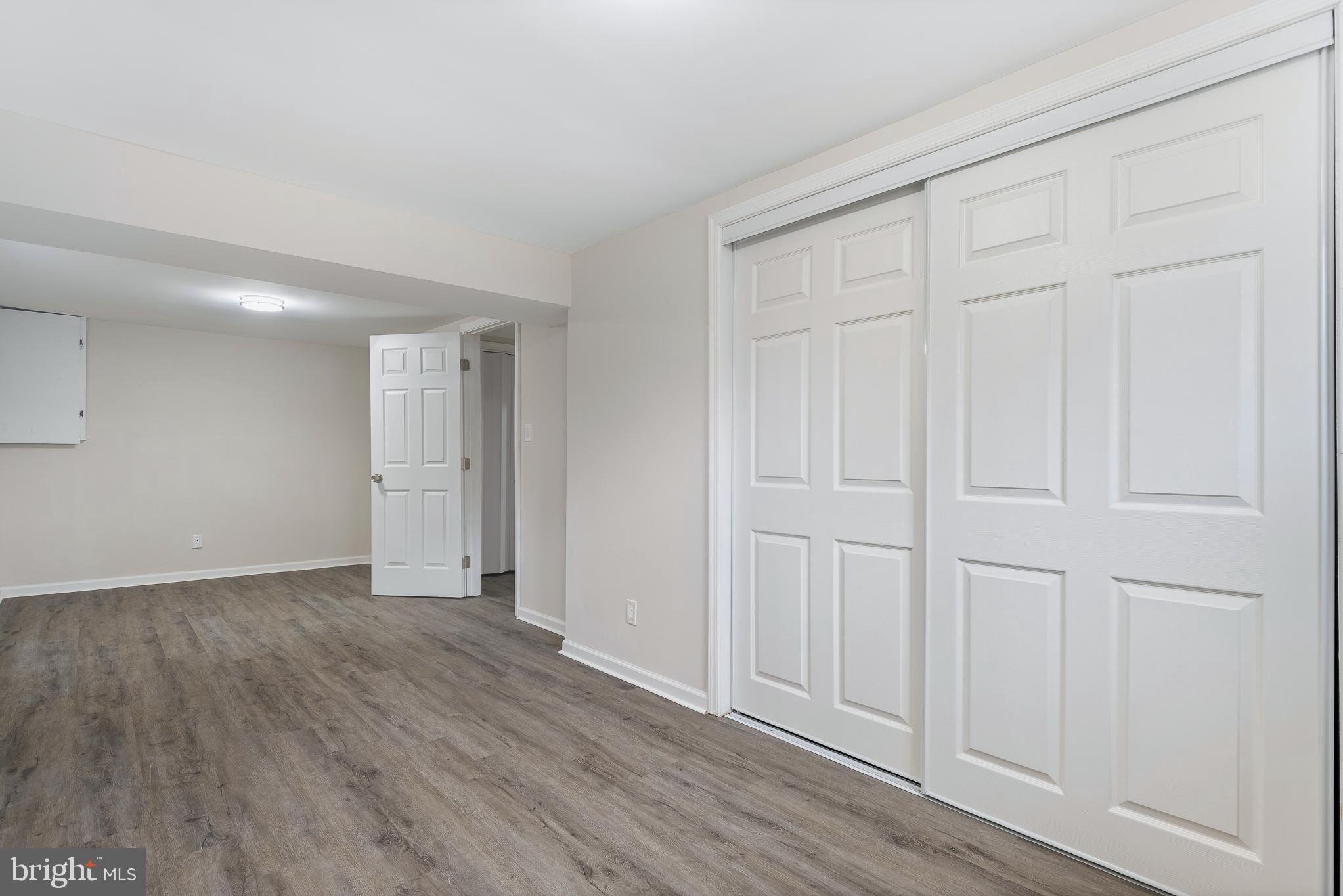 7804 D'Arcy Road District Heights, MD 20747 - Photo 29 of 61 an empty room with wooden floor