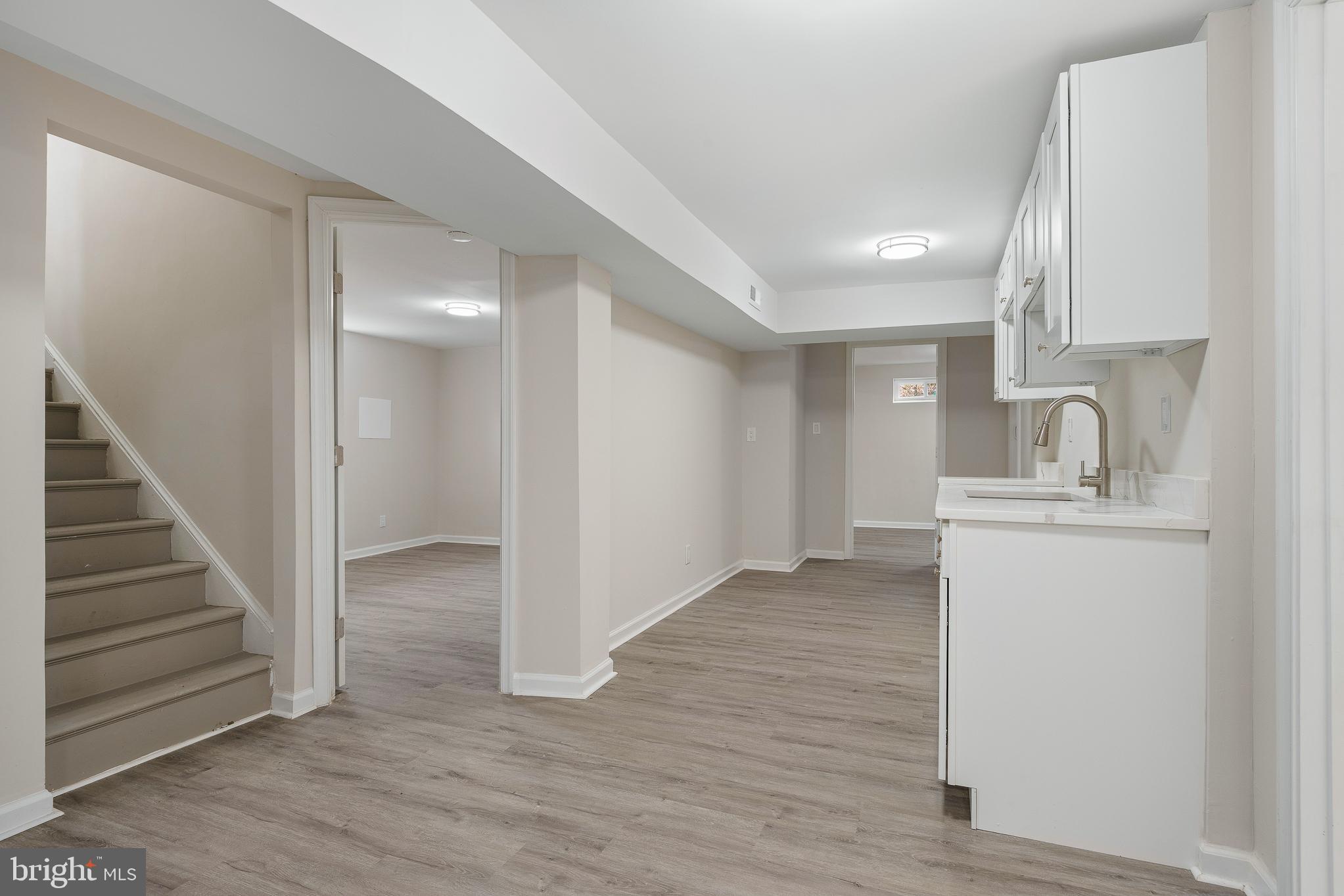 7804 D'Arcy Road District Heights, MD 20747 - Photo 34 of 61 a view of a kitchen from the hallway