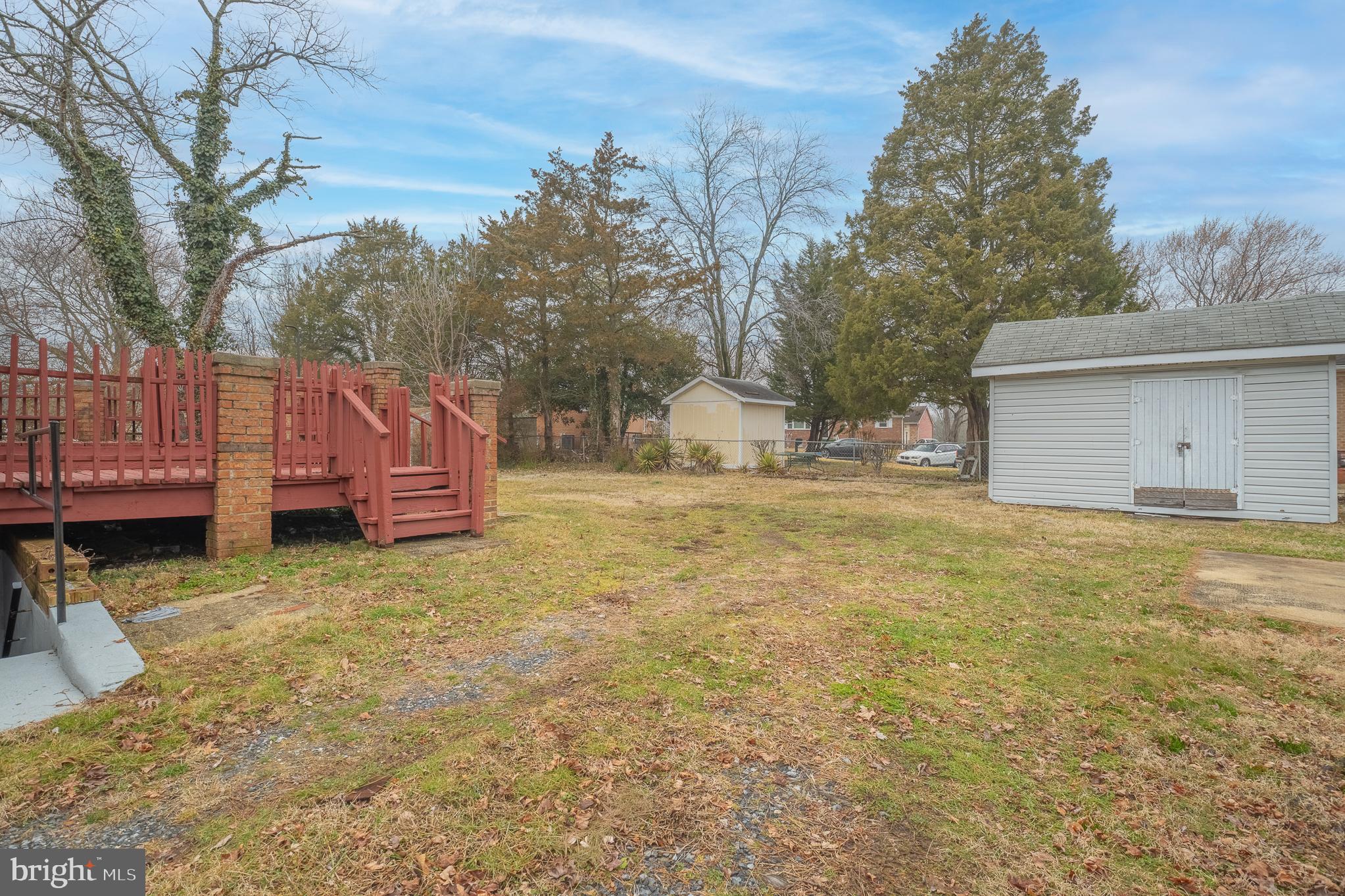 7804 D'Arcy Road District Heights, MD 20747 - Photo 50 of 61 a backyard of a house with table and chairs