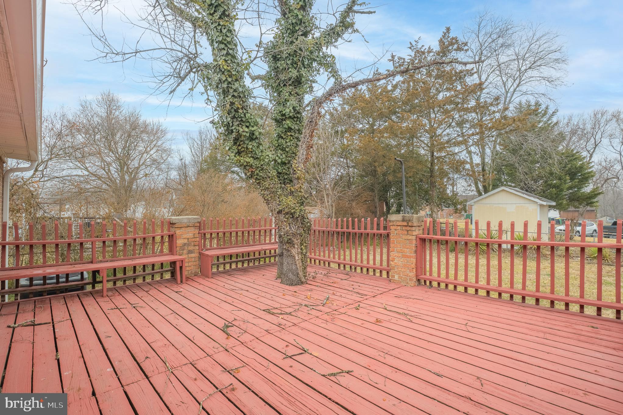 7804 D'Arcy Road District Heights, MD 20747 - Photo 57 of 61 a view of a wooden deck with a backyard