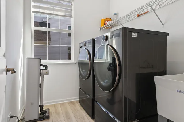 a utility room with dryer and washer