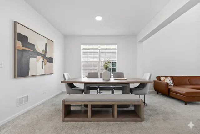 a view of a livingroom with furniture and window