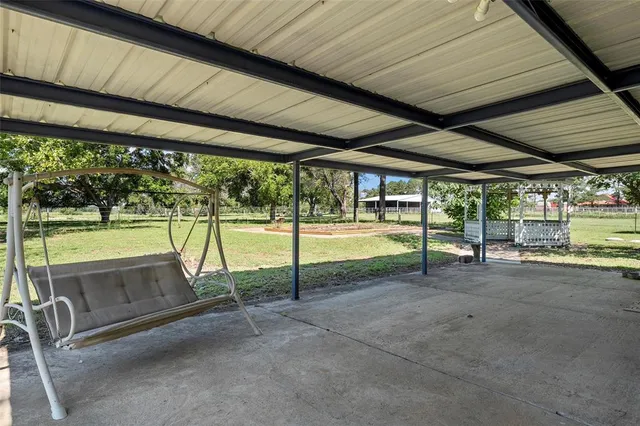 a view of a backyard of a house