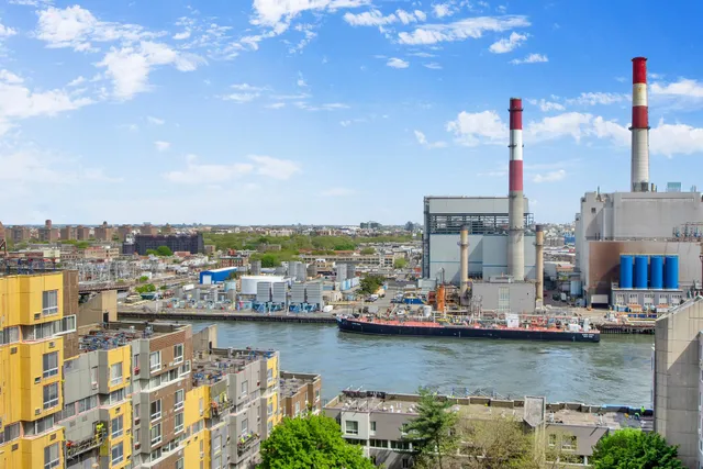 a view of a lake with a large building