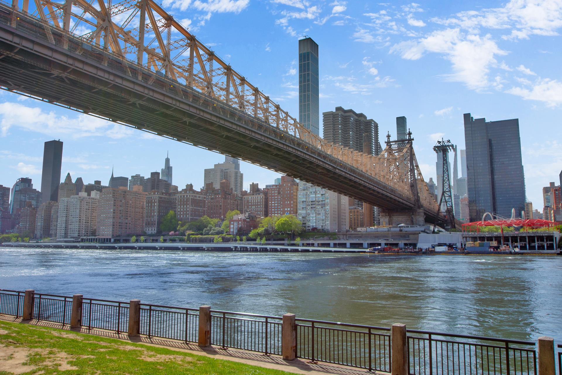 575 Main Street, Unit 1611 Manhattan, NY 10044 - Photo 9 of 9 a view of a swimming pool with a lake