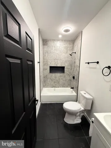 a bathroom with a bathtub