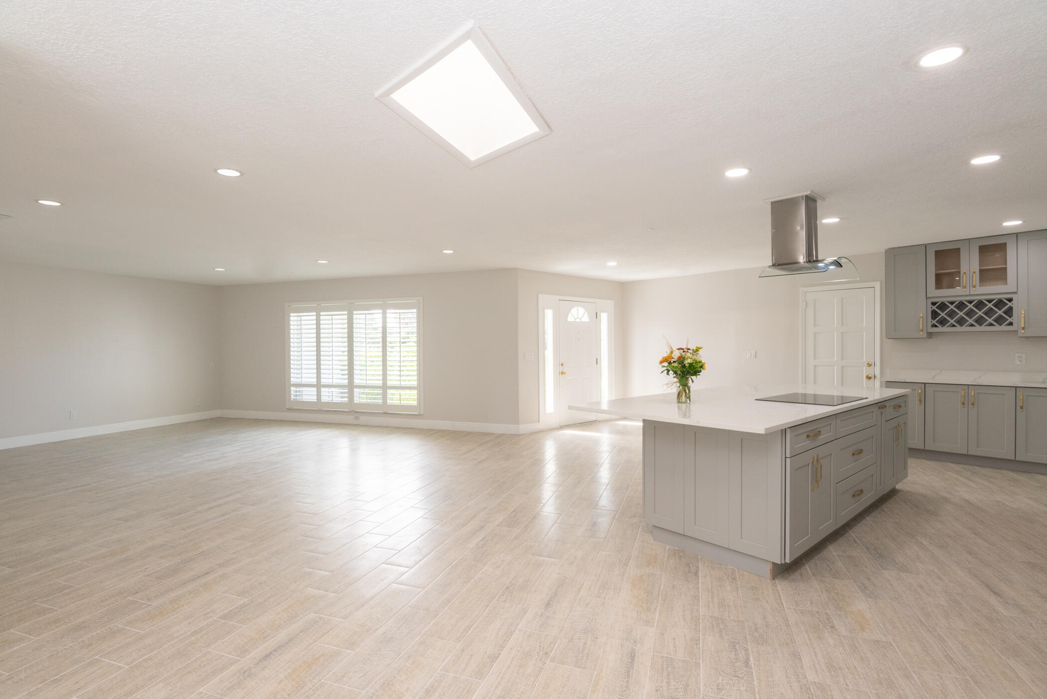 3441 Southeast Court Drive Stuart, FL 34997 - Photo 12 of 46 a view of kitchen with stove and wooden cabinets
