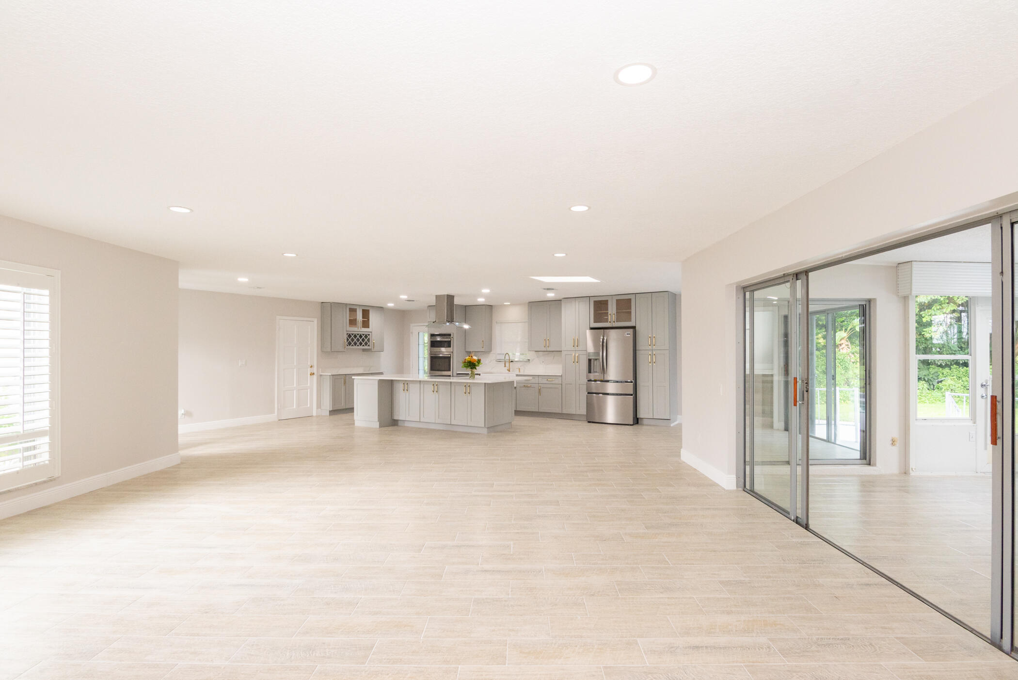 3441 Southeast Court Drive Stuart, FL 34997 - Photo 16 of 46 a view of kitchen with furniture and large window