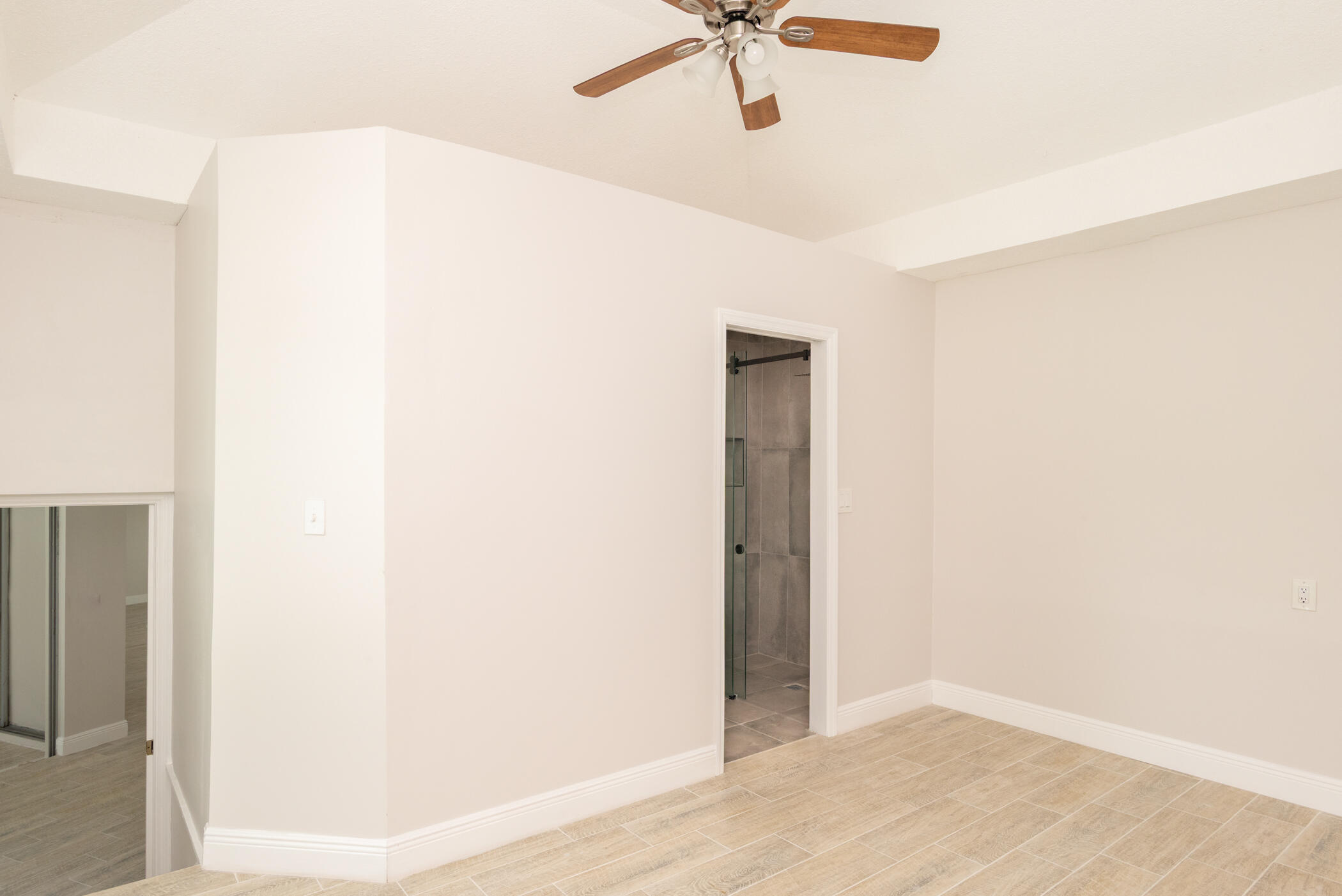 3441 Southeast Court Drive Stuart, FL 34997 - Photo 23 of 46 a view of a room with a ceiling fan