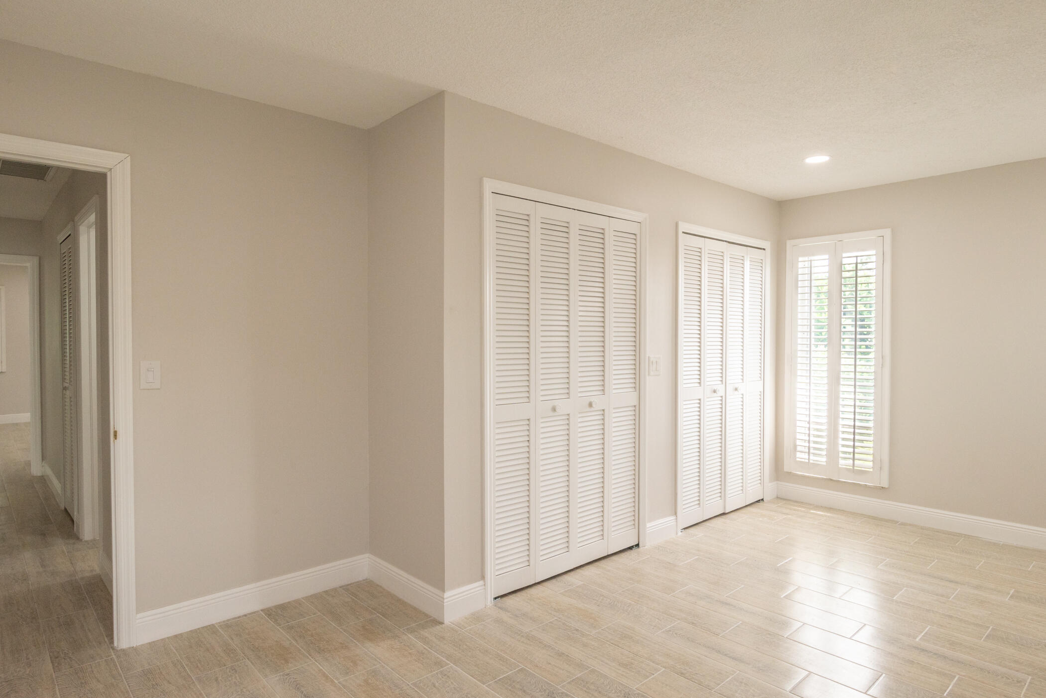3441 Southeast Court Drive Stuart, FL 34997 - Photo 26 of 46 an empty room with windows