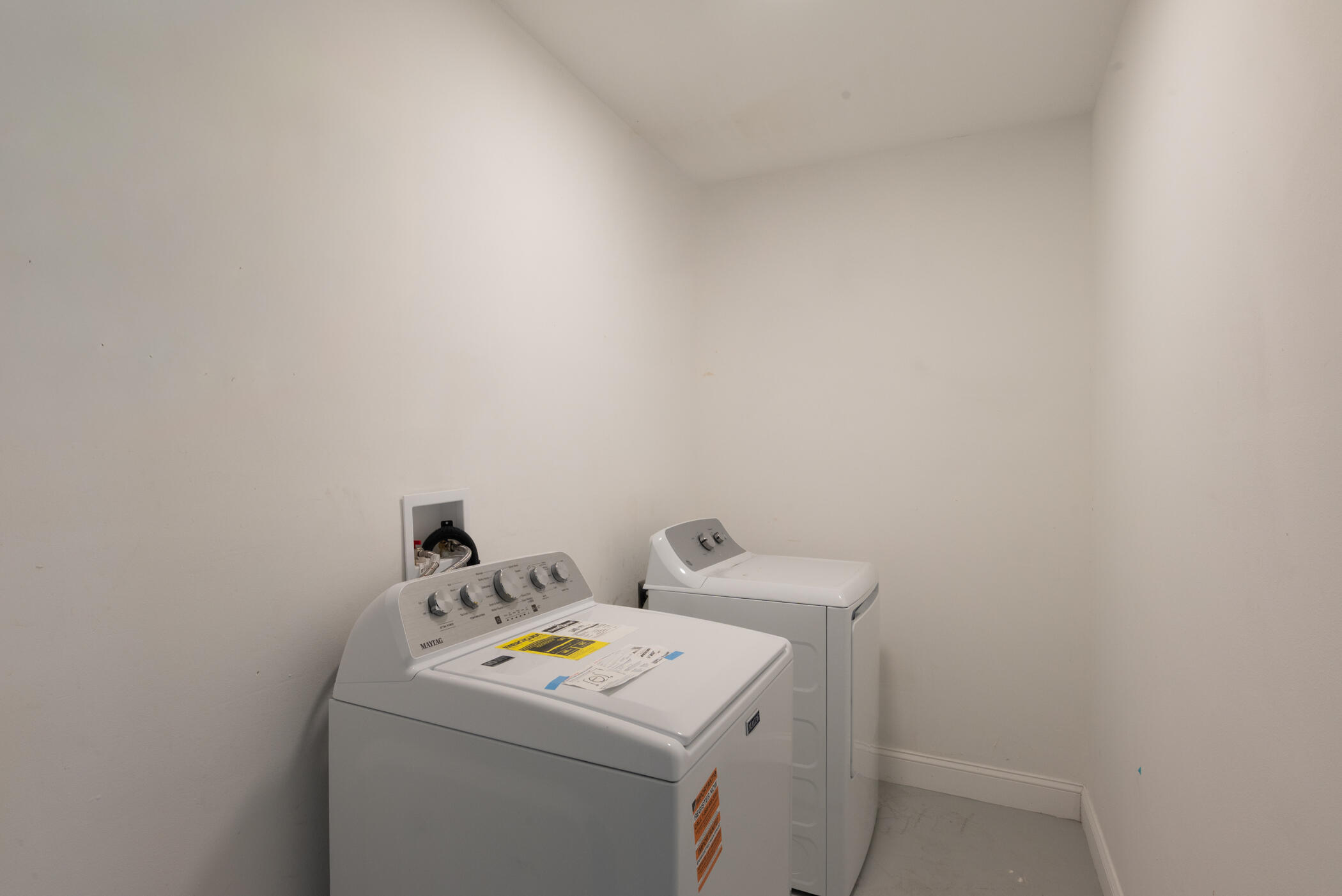 3441 Southeast Court Drive Stuart, FL 34997 - Photo 35 of 46 a utility room with dryer and washer