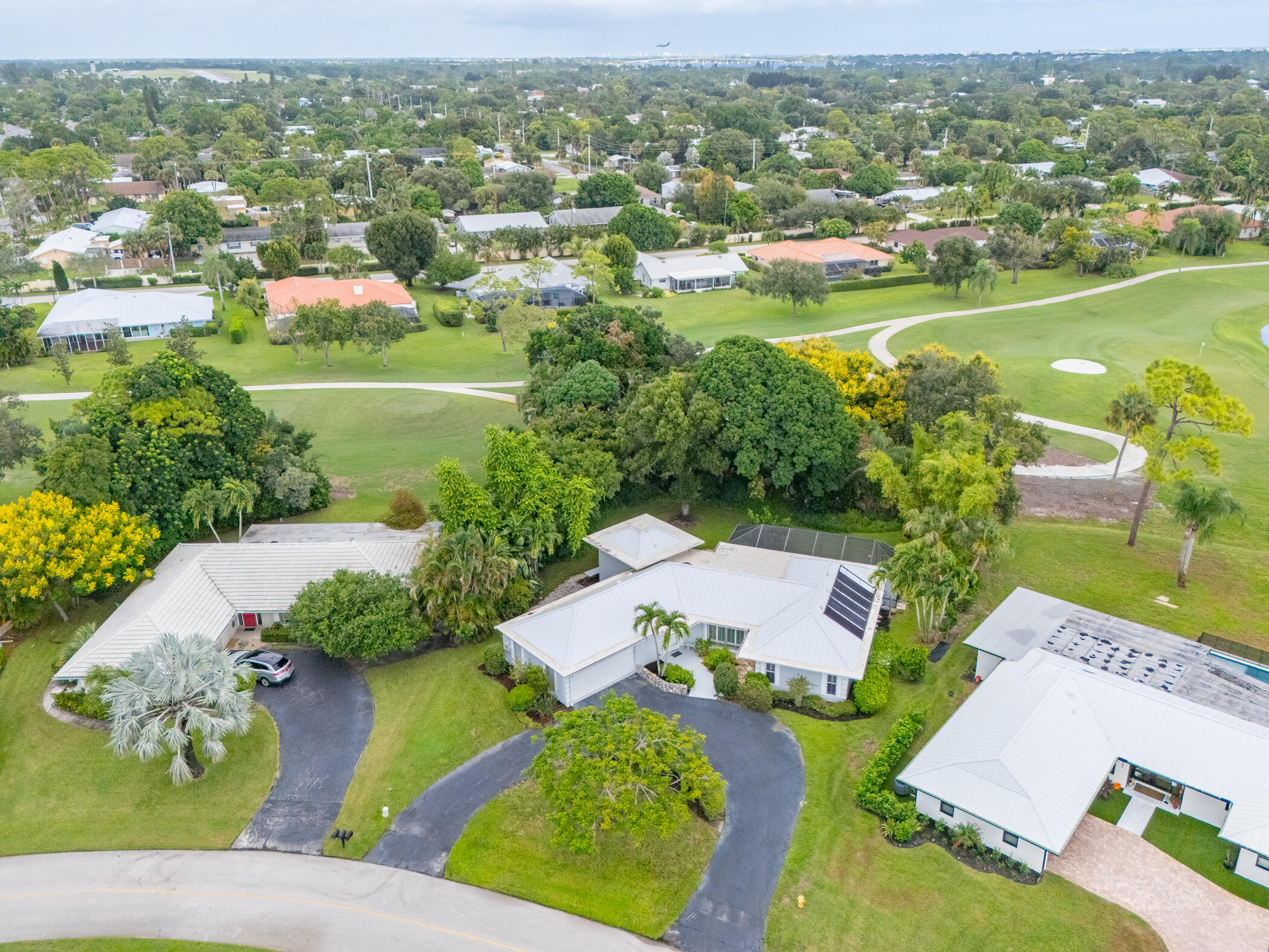 3441 Southeast Court Drive Stuart, FL 34997 - Photo 45 of 46 an aerial view of a city with lots of residential buildings